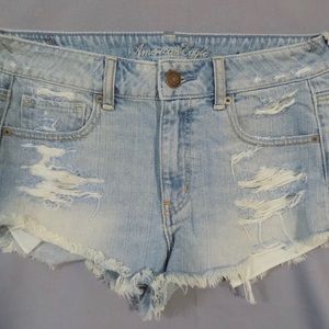 American Eagle light wash distressed denim shorts Size 8